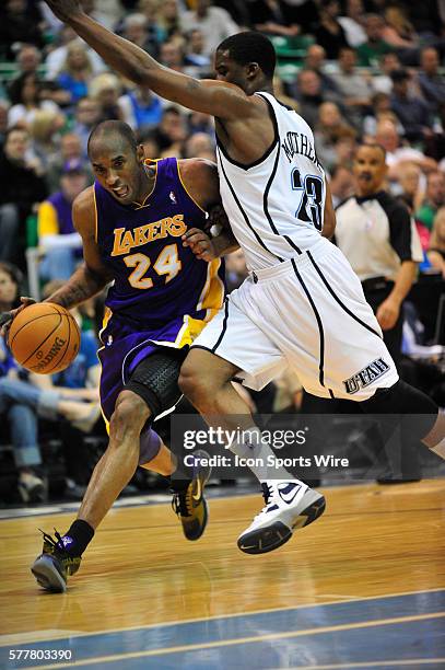 Los Angeles Lakers guard Kobe Bryant tries to drive by Utah Jazz guard Wesley Matthews during the game. The Los Angeles Lakers defeated the Utah Jazz...