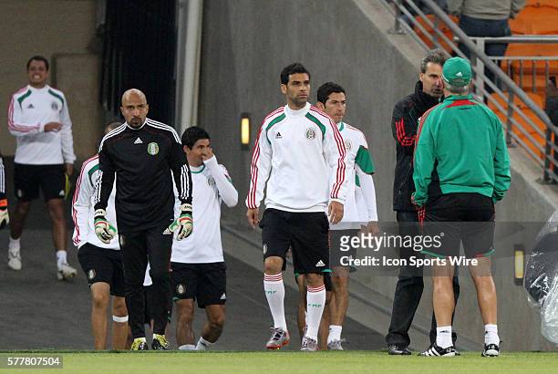 Team captain Rafael Marquez leads the team onto the field. The Mexico National Team held a light practice at Soccer City Stadium in Johannesburg,...