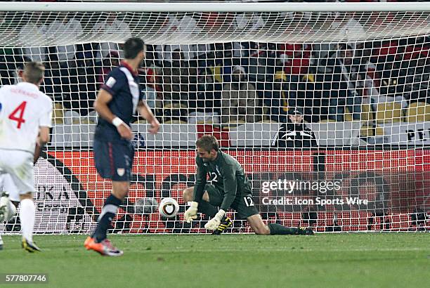 Clint Dempsey looks on as his goal strike is bobbled by goalie Robert Green for the equalizing goal of the match. The England National Team played...