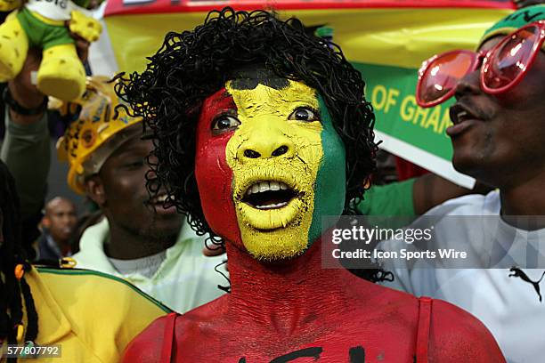 Ghana fans celebrate their team's win. The Serbia National Team played the Ghana National Team at Loftus Versfeld Stadium in Tshwane/Pretoria, South...