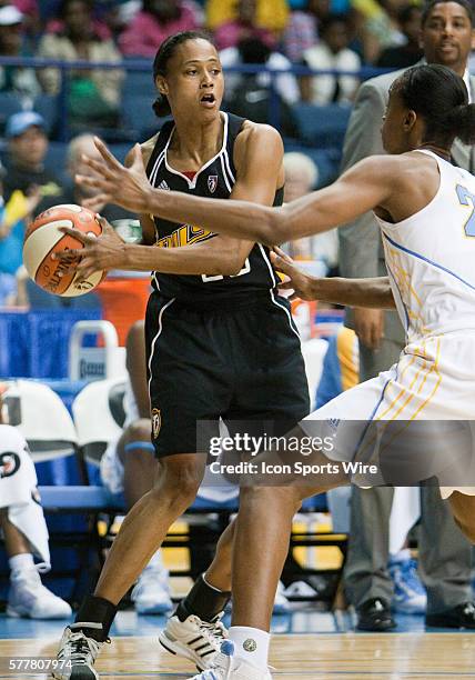 Tulsa Shock player Marion Jones looks to pass against the Chicago Sky at Allstate Arena, Rosemont, Illinois.