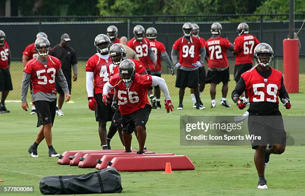 Linebacker Dekoda Watson and fellow linebackers go thru drills during the Buccaneers OTA at One Buccaneer Place in Tampa, Florida.