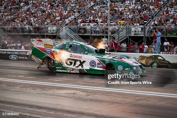 Ashley Force Hood in the Castrol GTX Ford Mustang fuel funny car launches down the track in round 2 of fuel funny car qualifying at the NHRA Thunder...