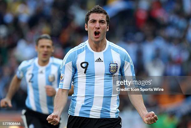 Gonzalo Higuain celebrates his first goal. The Argentina National Team defeated the South Korea National Team 4-1 at Soccer City Stadium in...