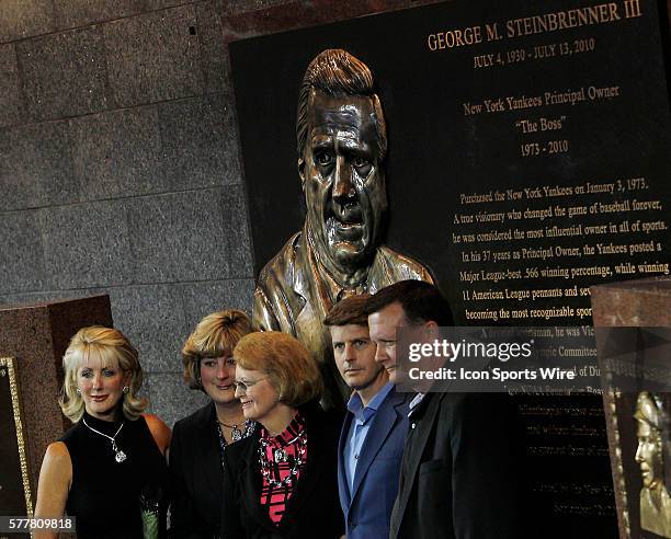 Jennifer Steinbrenner Swindal, Jessica Steinbrenner, Joan Steinbrenner, Hal Steinbrenner and Hank Steinbrenner pose with a plaque in memory of George...