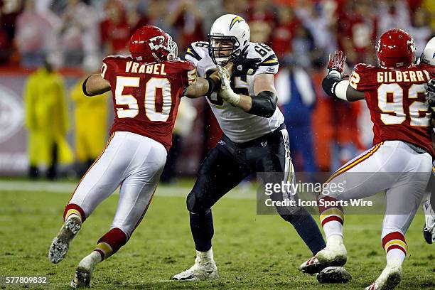 Chargers offensive lineman Jeromey Clary does battle with Chiefs linebacker Mike Vrabel. The Kansas City Chiefs defeated the San Diego Chargers 21 to...