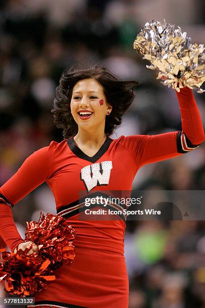 Wisconsin dance team member performs during the basketball game between the Wisconsin Badgers vs Michigan State Spartans at Bankers Life Fieldhouse...