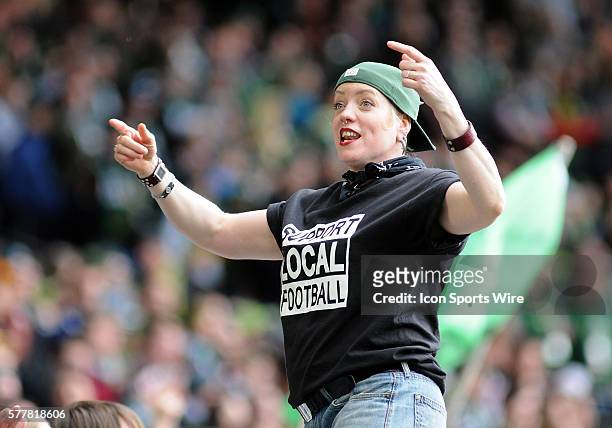 March 16, 2014 - A member of the Timbers Army leads a chant during a Major League Soccer game between the Portland Timbers and Chicago Fire at...
