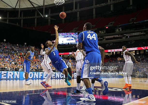 Kentucky Wildcats guard/forward James Young shoots in the Florida Gators 61-60 victory over the Kentucky Wildcats in the SEC Tournament at The...