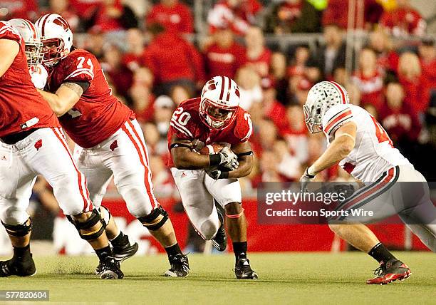 Wisconsin Badgers running back James White brings the ball upfield. The Wisconsin Badgers won over the Ohio State Buckeyes 31-18 at Camp Randall...