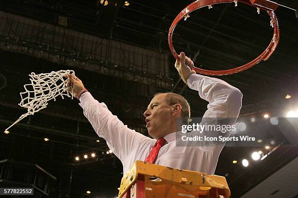 Louisiana Lafayette Ragin Cajuns head coach Bob Marlin celebrates with the Ragin' Cajun fans after cutting the net down at the Georgia State v...