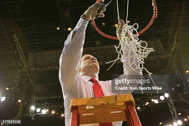 Louisiana Lafayette Ragin Cajuns head coach Bob Marlin cuts the net after the Georgia State v University of Louisiana Lafayette Men's championship...