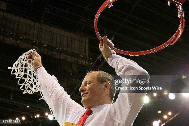 Louisiana Lafayette Ragin Cajuns head coach Bob Marlin cuts down the net after the Georgia State v University of Louisiana Lafayette Men's...