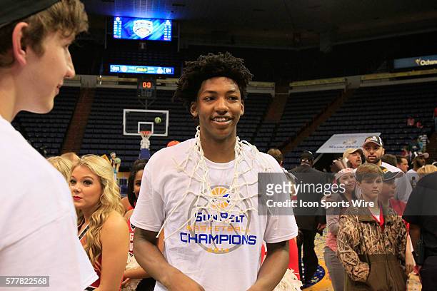 Louisiana Lafayette Ragin Cajuns guard Elfrid Payton wears the net after his team defeated the Georgia State v University Panthers by a score of...