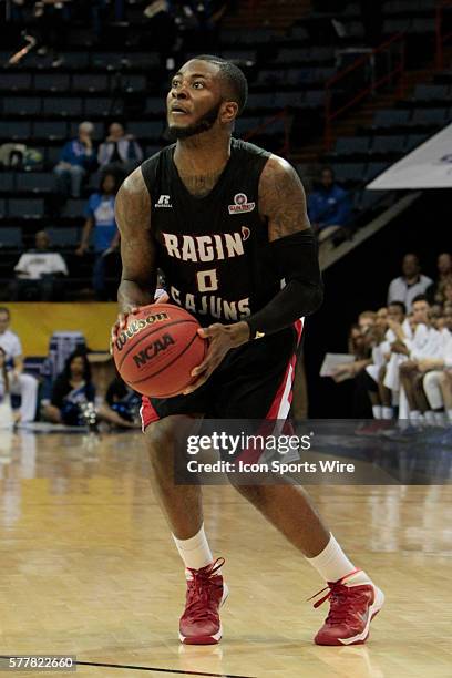 Most Valuable Player for the Championship, Louisiana Lafayette Ragin Cajuns guard Bryant Mbamalu during the Georgia State v University of Louisiana...