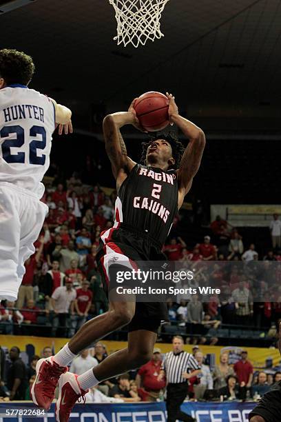 Louisiana Lafayette Ragin Cajuns guard Elfrid Payton scores during the OT the Georgia State v University of Louisiana Lafayette Men's championship...