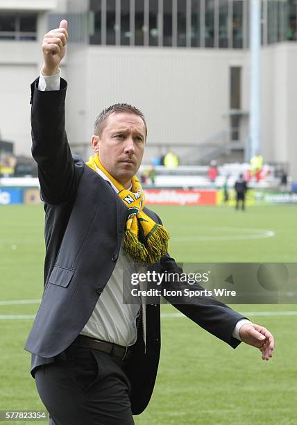 March 16, 2014 - Portland Timbers head coach Caleb Porter acknowledges the Timbers Army after the game during a Major League Soccer game between the...