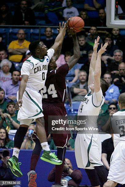 David Nwaba of the Cal Poly Mustangs blocks the shot by C Aaric Murray of the Texas Southern Tigers during the first round of the Cal Poly Mustangs...