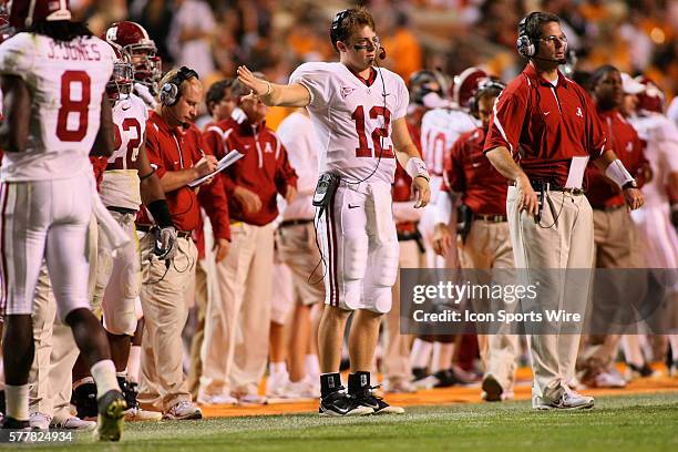 Alabama starting quarterback Greg McElroy calls plays from the sidelines late in the fourth quarter. The Tennessee Volunteers were defeated by the...