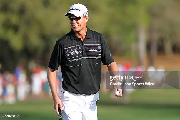 John Senden of Brisbane, Queensland, Australia walks away from the hole after rolling in his final putt during the final round of the Valspar...