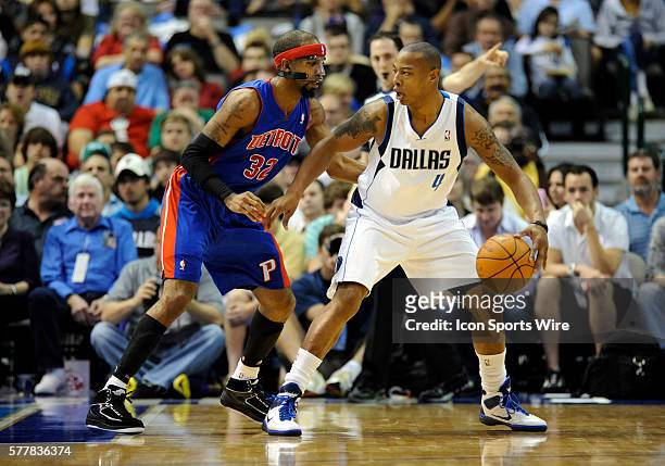 Dallas Mavericks guard Caron Butler is defended by Detroit Pistons shooting guard Richard Hamilton during an NBA game between the Detroit Pistons and...