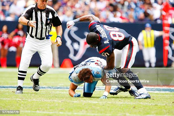 Houston Texans wide receiver Andre Johnson and Tennessee Titans cornerback Cortland Finnegan get into a fight during the game between the Tennessee...