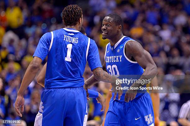 Kentucky Wildcats forward Julius Randle and Kentucky Wildcats guard/forward James Young in action during the Div I Men's Championship - Elite Eight...