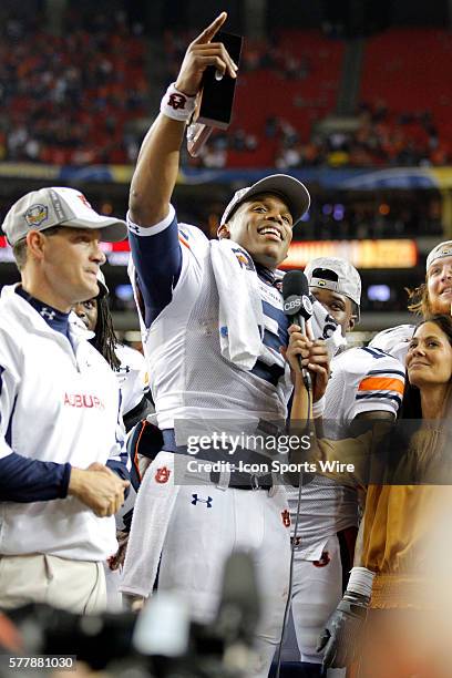 Auburn Tigers quarterback Cameron Newton during the trophy presentation in the Auburn Tigers 56-17 victory over the South Carolina Gamecocks in the...