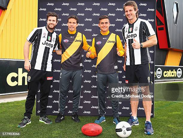 Trent Cotchin and Ivan Maric of the Tigers pose with Hernanes and Paulo Dybala of Juventus during a Richmond Tigers AFL and Juventus FC media...