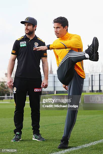 Trent Cotchin of the Tigers watches Hernanes of Juventus kick a ball during a Richmond Tigers AFL and Juventus FC media opportunity at Punt Road Oval...