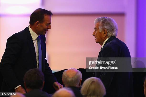 Former Australian Prime Ministers Tony Abbott and Bob Hawke arrive before US Vice-President Joe Biden delivered a speech on the future of the...