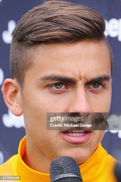 Paulo Dybala of Juventus speaks to media during a Richmond Tigers AFL and Juventus FC media opportunity at Punt Road Oval on July 20, 2016 in...