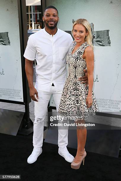 Actress Nicky Whelan and football player Kerry Rhodes arrive at the premiere of New Line Cinema's "Lights Out" at the TCL Chinese Theatre on July 19,...