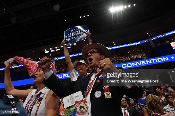 California delegates Ann-Marie Villicana and Erik Laykin react as Governor Chris Christie addresses the second day of the Republican National...