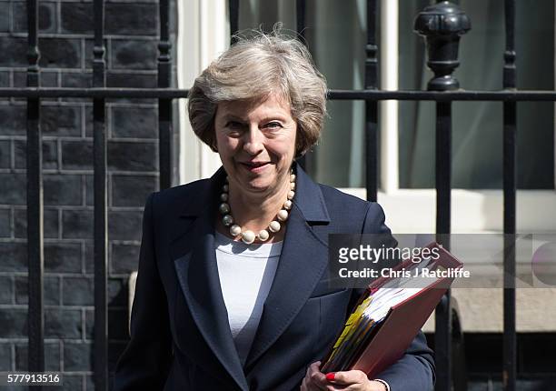 British Prime Minister Theresa May leaves number 10 Downing Street to attend Prime Minister's Questions at the Houses of Parliament on July 20, 2016...
