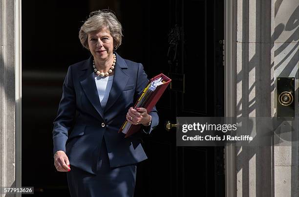 British Prime Minister Theresa May leaves number 10 Downing Street to attend Prime Minister's Questions at the Houses of Parliament on July 20, 2016...