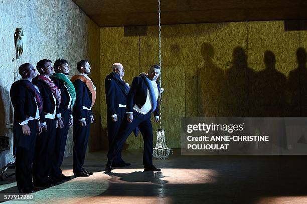 Actors of the Moscow Gogol Center company perform during a rehearsal of the play "Les Âmes mortes" written by Nikolaï Gogol and directed by Russian...