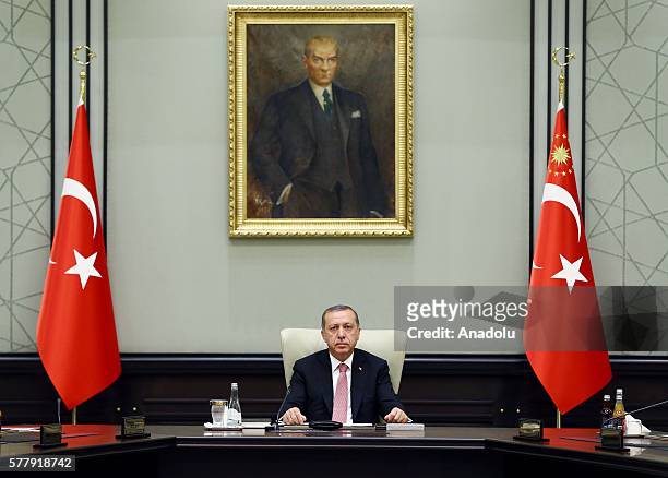 Turkish President Recep Tayyip Erdogan chairs a meeting of the National Security Council at the Presidential Palace in Ankara, Turkey on July 20,...