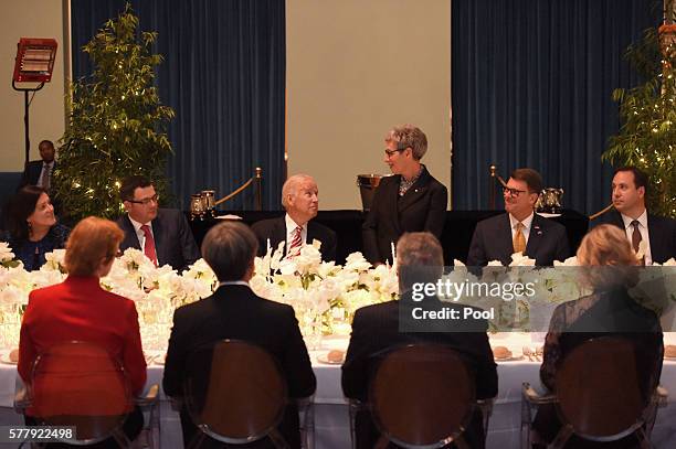 Vice President Joe Biden and Victorian Premier Daniel Andrews listen to the Governor of Victoria Linda Dessau give a speech during a dinner at...