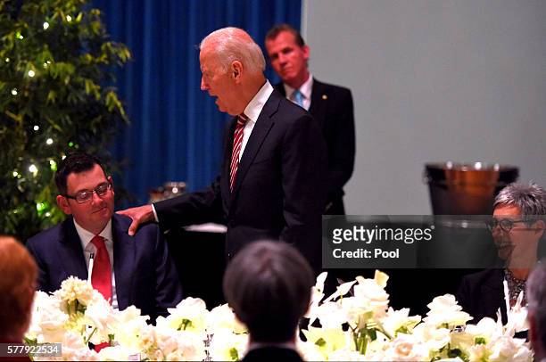 Vice President Joe Biden places his hand on Daniel Andrews sholder as he speaks during a dinner with the Governor of Victoria Linda Dessau at...