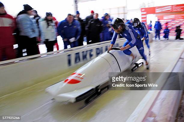 Alexander Kasjanov pushes his 2-man bobsled for Russia, finishing in 10th place at the Viessmann FIBT World Cup Bobsled Championships on Mount Van...