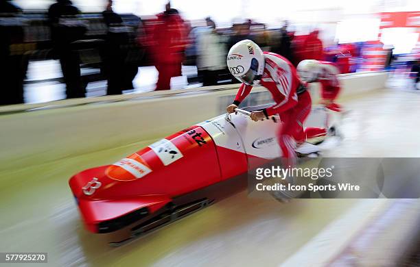 Gregor Baumann pushes his 2-man bobsled for Switzerland, finishing in 12th place at the Viessmann FIBT World Cup Bobsled Championships on Mount Van...