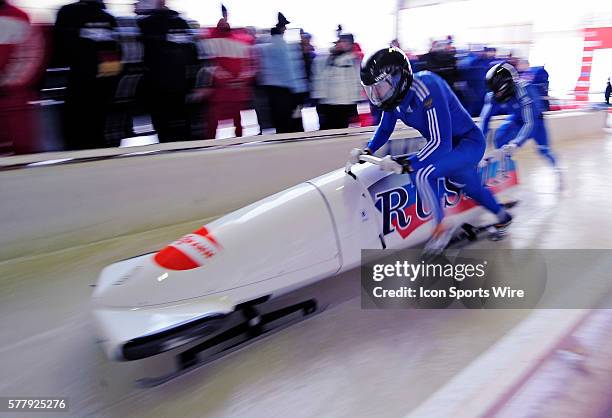 Alexandr Zubkov pushes his 2-man bobsled for Germany, taking the silver at the Viessmann FIBT World Cup Bobsled Championships on Mount Van Hoevenberg...