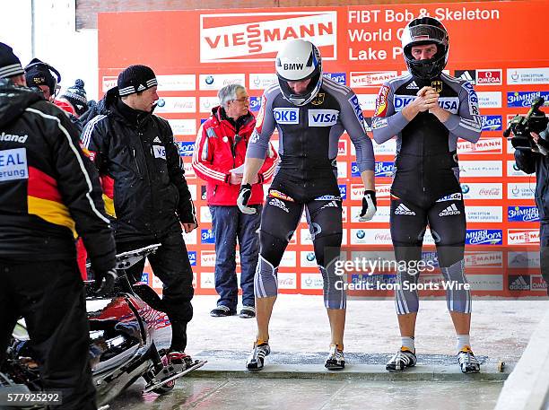 Karl Angerer and his brakeman Alex Mann prepare to push of their 2-man bobsled for Germany, taking the bronze at the Viessmann FIBT World Cup Bobsled...