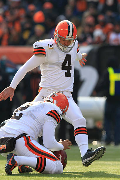 Cleveland Browns kicker Phil Dawson and holder Reggie Hodges against the Cincinnati Bengals' during their NFL game at Paul Brown Stadium in...