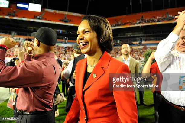 Stanford faculty member Condoleezza Rice celebrates after the end of the Discover Orange Bowl game between Stanford Cardinal and the Virginia Tech...