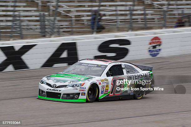 Kyle Busch, driver of the Interstate Batteries Toyota during qualifying for tomorrow's 18th Annual Duck Commander 500 at Texas Motor Speedway in Ft....