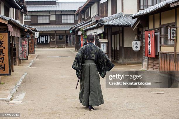 warrior samurai costume man in toei studios at kyoto japan - samurai stock pictures, royalty-free photos & images