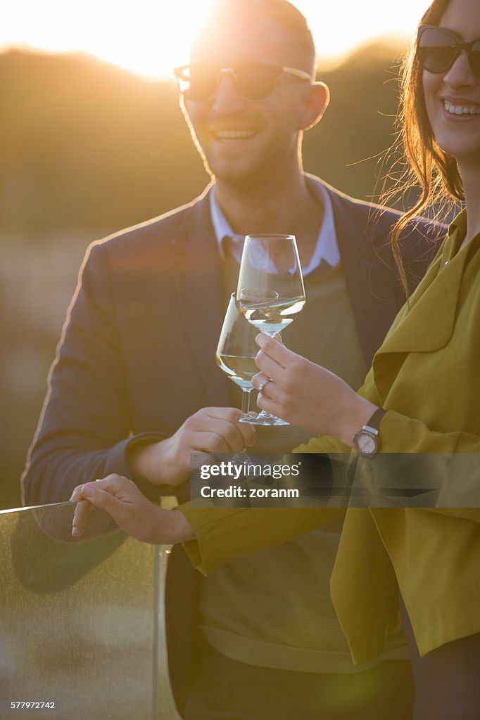 Couple having wine together