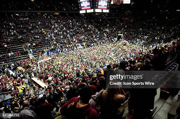 Seminole fans rush the court after Florida State's 66-61 victory over Duke on Wednesday, January 12, 2011 in the Leon County Civic Center.